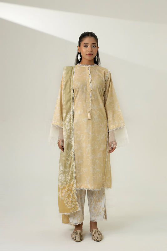 Woman wearing a beige traditional outfit with a plain background