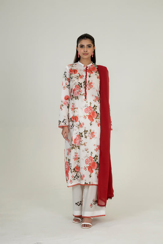 Woman wearing a floral kurta with a red dupatta on a white background