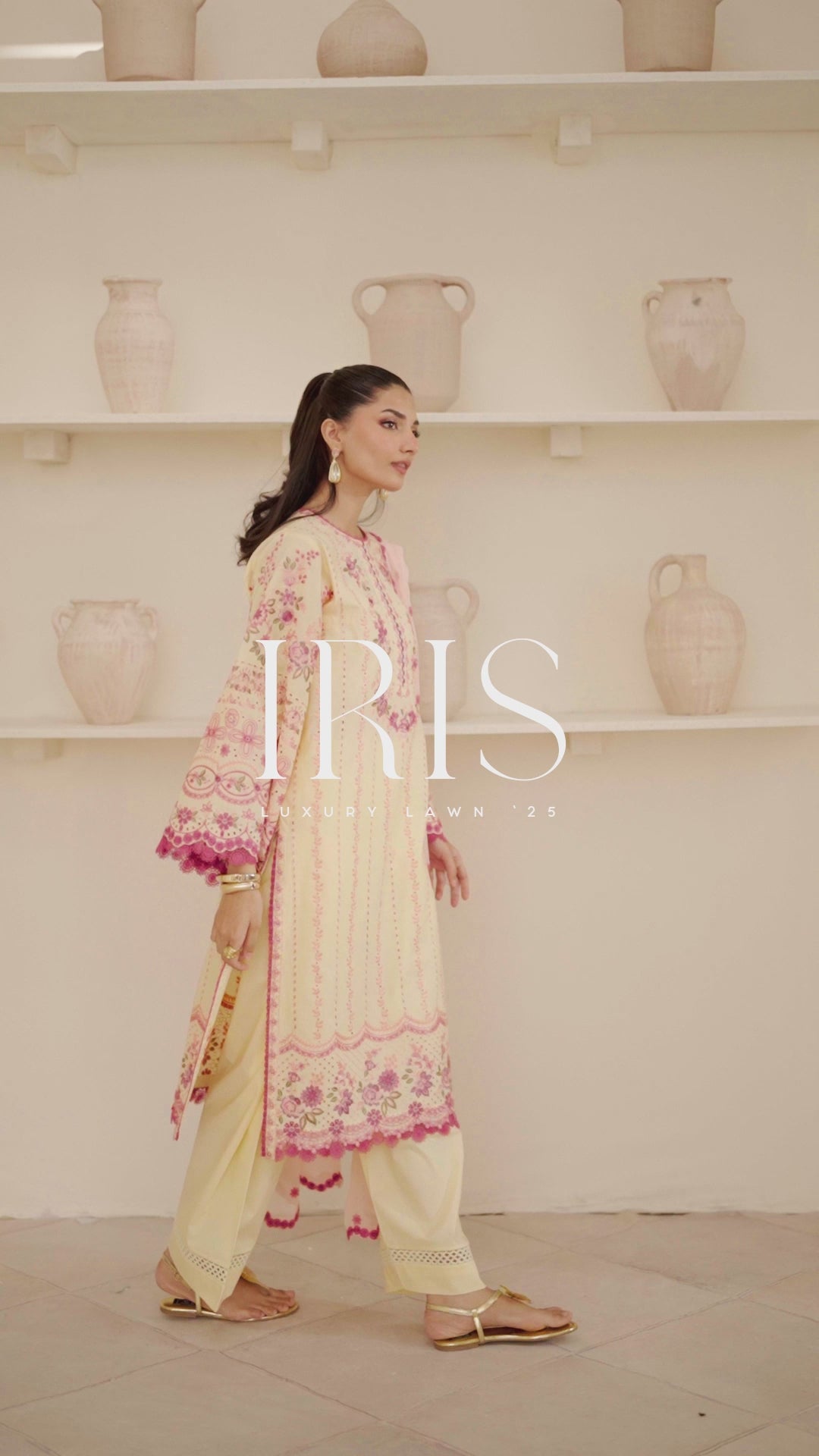 woman wearing a traditional yellow dress with intricate embroidery video